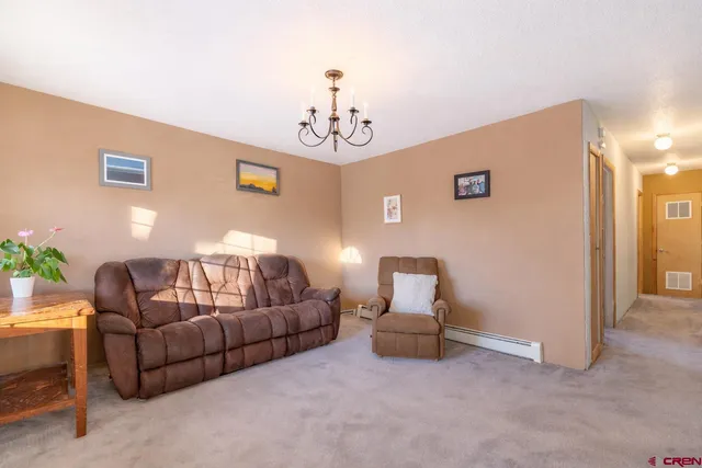 a kitchen with a sink a stove and cabinets