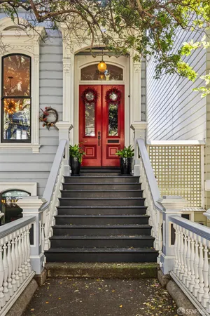 a view of entryway with furniture and stairs