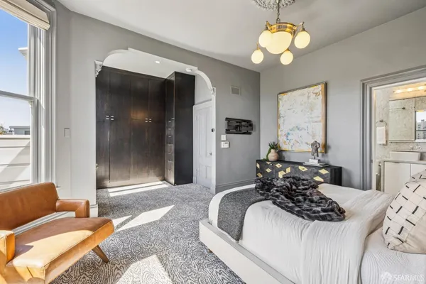 a view of balcony with wooden floor and outdoor seating