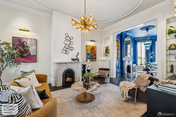 a living room with furniture fireplace and a fireplace