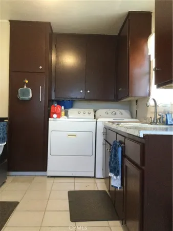 a utility room with washer and dryer