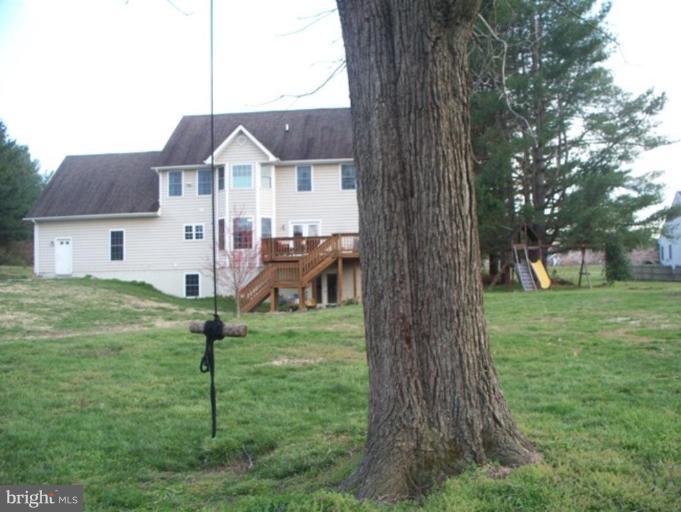 3185 Jones Road Dunkirk, MD 20754 - Photo 17 of 28 a front view of house with a garden
