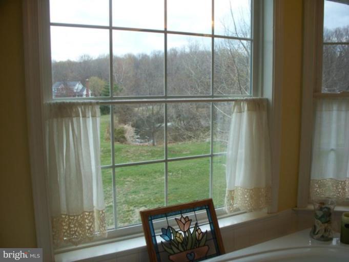 3185 Jones Road Dunkirk, MD 20754 - Photo 19 of 28 a view of a bench in balcony