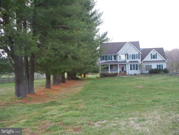 3185 Jones Road Dunkirk, MD 20754 - Photo 20 of 28 a front view of a house with a garden
