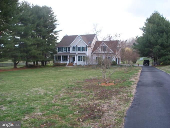 3185 Jones Road Dunkirk, MD 20754 - Photo 21 of 28 a view of a house with a yard