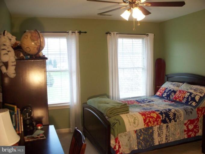 3185 Jones Road Dunkirk, MD 20754 - Photo 25 of 28 a bedroom with a bed and a window