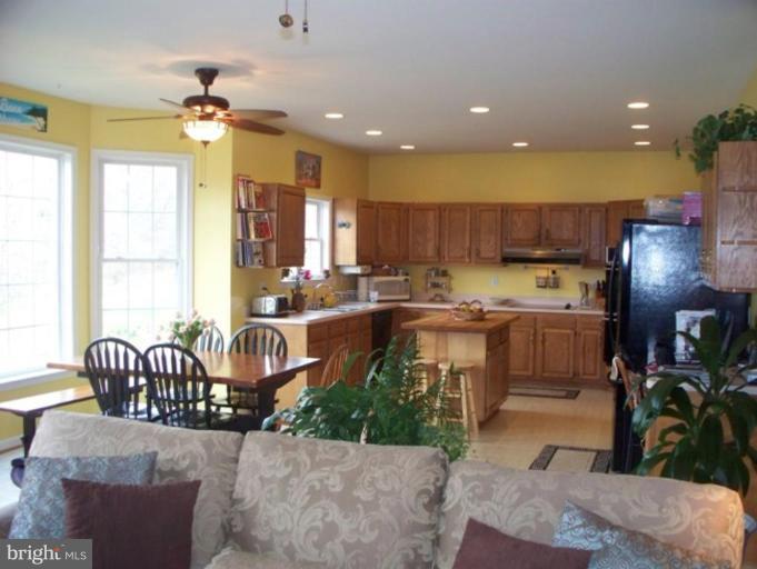 3185 Jones Road Dunkirk, MD 20754 - Photo 5 of 28 a kitchen with sink refrigerator and outdoor view