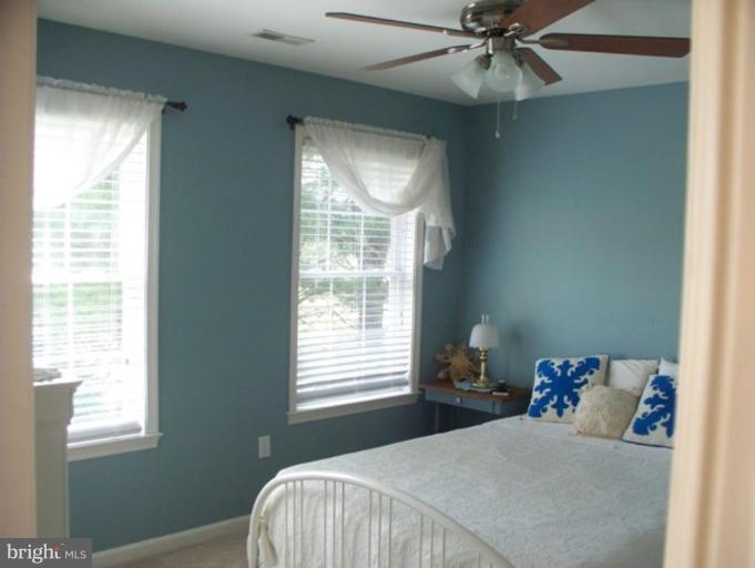 3185 Jones Road Dunkirk, MD 20754 - Photo 8 of 28 a bedroom with a bed and a window