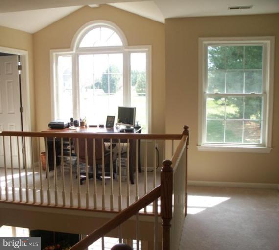 3185 Jones Road Dunkirk, MD 20754 - Photo 27 of 28 a view of a dining room with furniture and windows