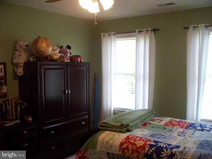 3185 Jones Road Dunkirk, MD 20754 - Photo 9 of 28 a bedroom with a bed and a window
