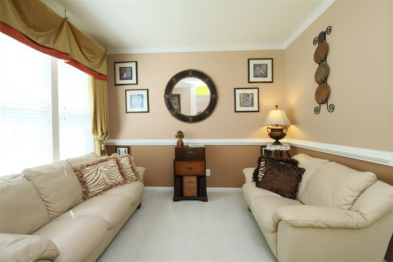5013 Amberfield Way Raleigh, NC 27604 - Photo 6 of 30 Entertain guest, or quietly read a book and relax. Formal sitting room