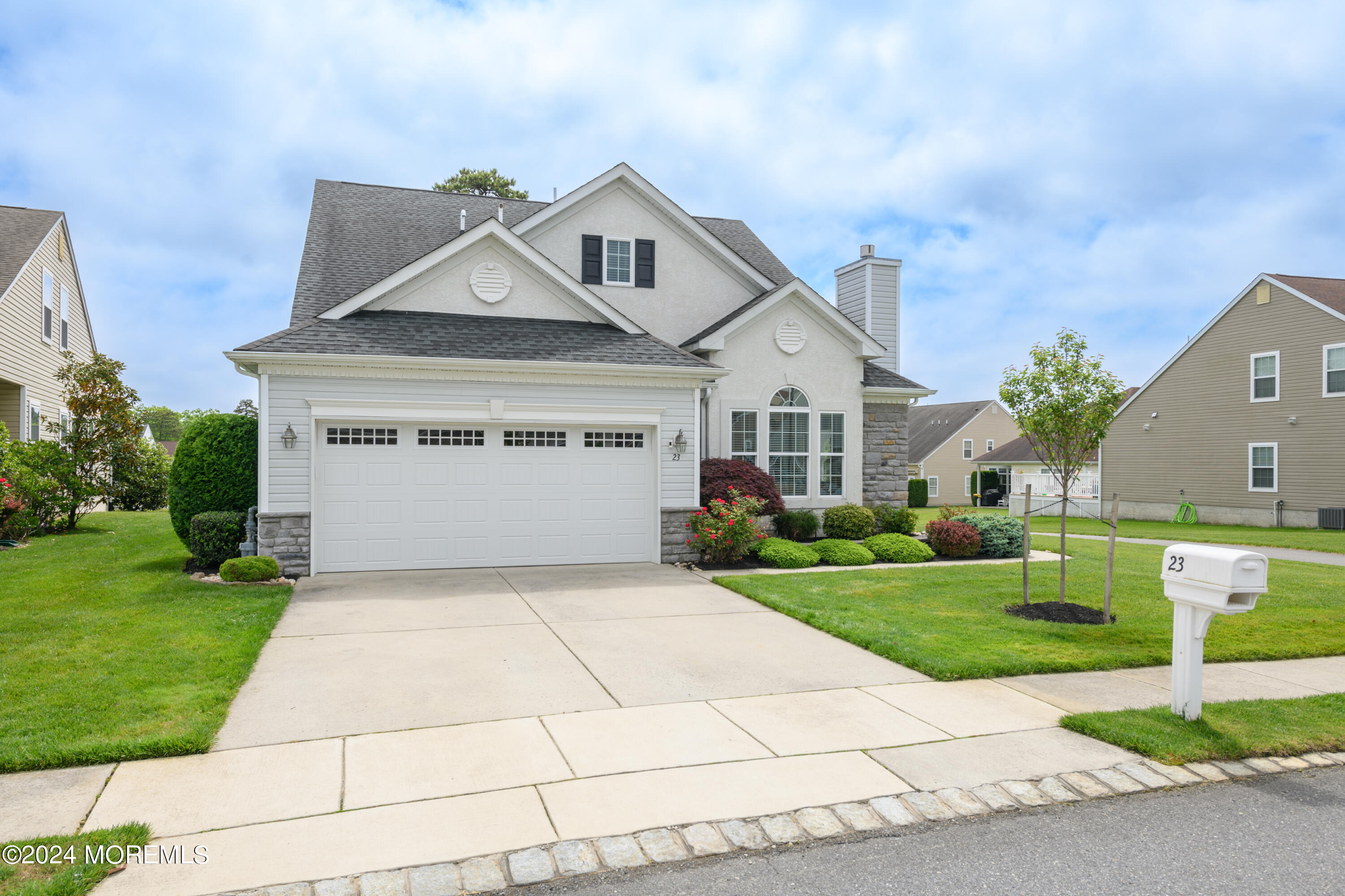 23 Sea Bright Way Waretown, NJ 08758 - Photo 2 of 59 a front view of house with yard and green space