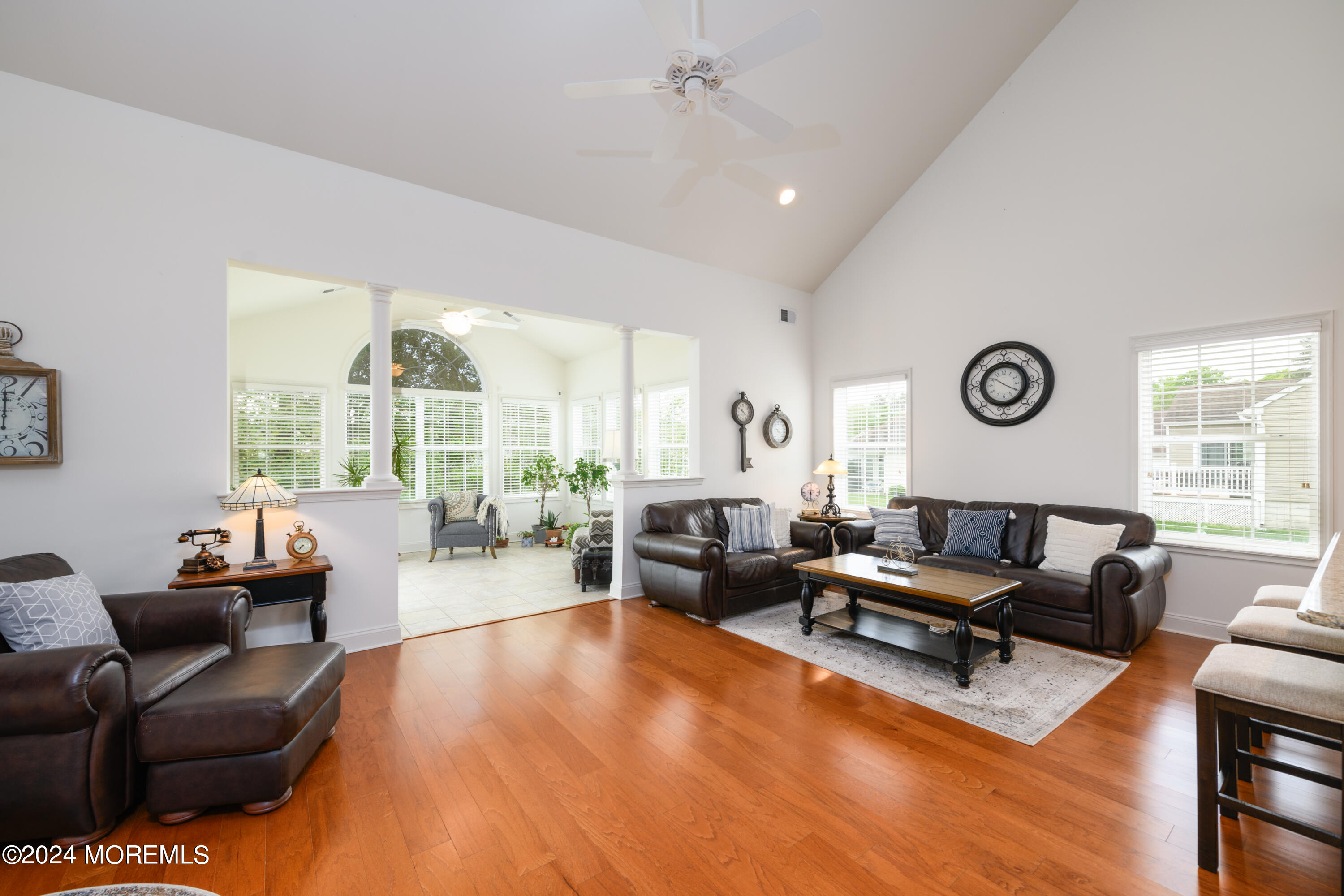 23 Sea Bright Way Waretown, NJ 08758 - Photo 25 of 59 a living room with furniture and a large window