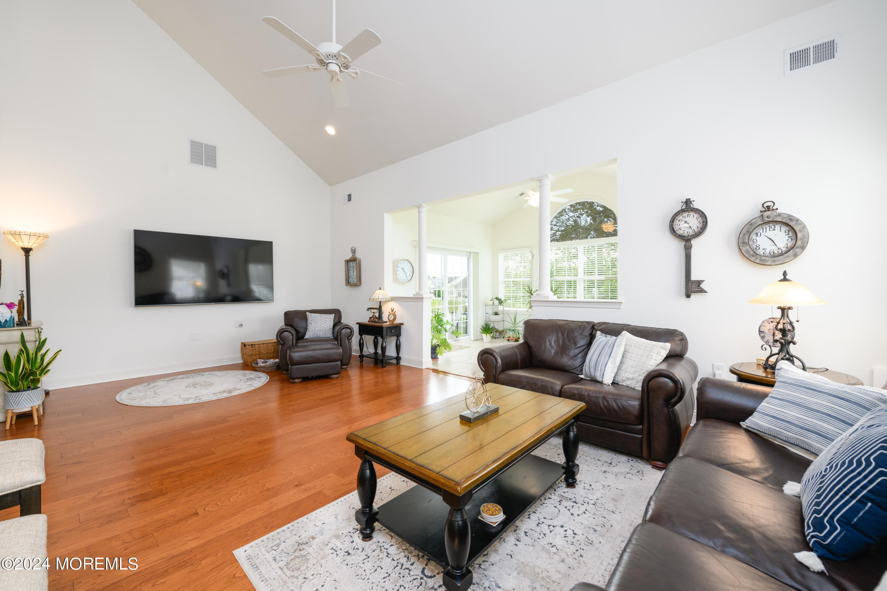 23 Sea Bright Way Waretown, NJ 08758 - Photo 27 of 59 a living room with furniture and a flat screen tv