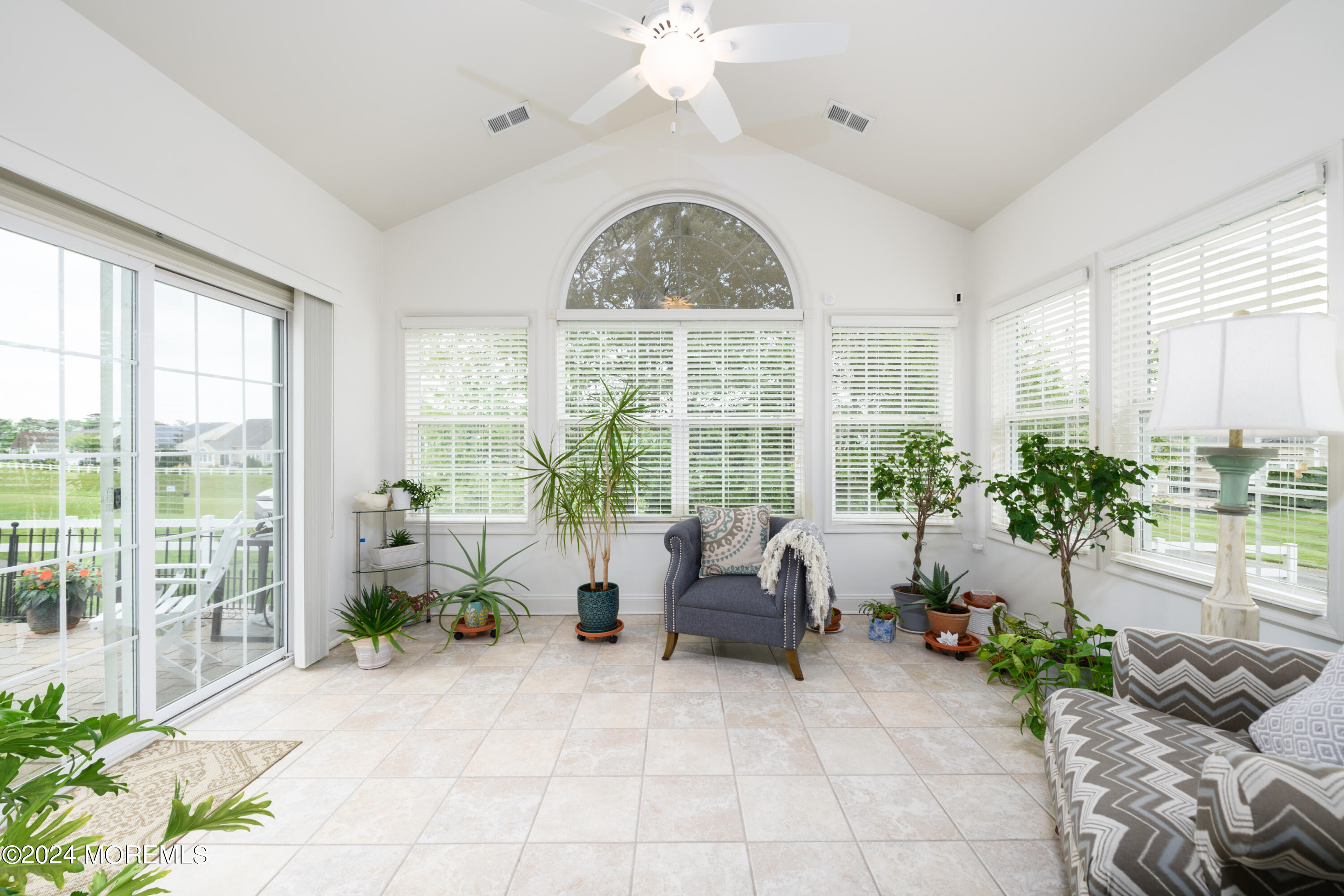 23 Sea Bright Way Waretown, NJ 08758 - Photo 29 of 59 a living room with furniture and a large window