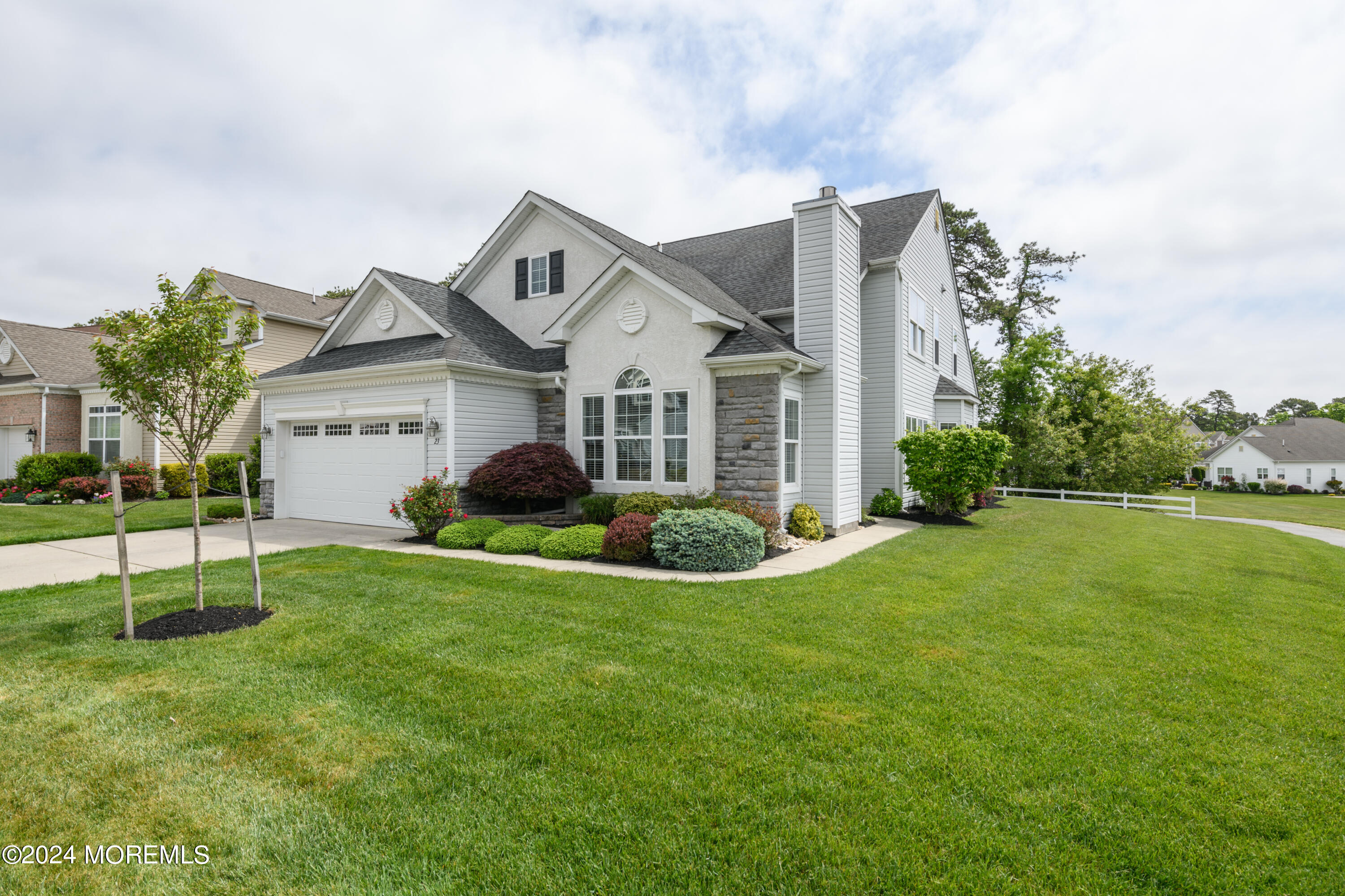 23 Sea Bright Way Waretown, NJ 08758 - Photo 3 of 59 a view of a house with a big yard plants and large trees