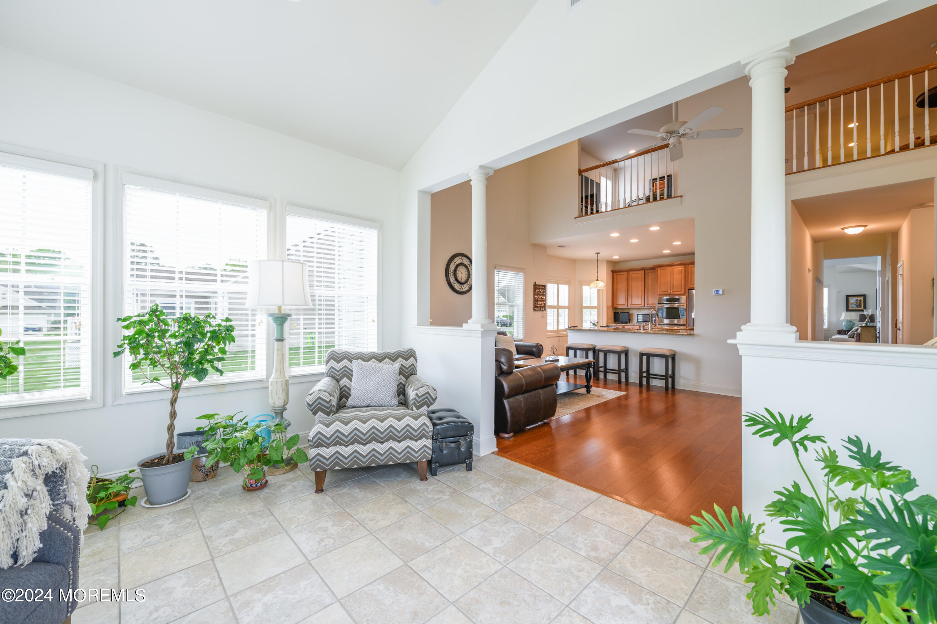 23 Sea Bright Way Waretown, NJ 08758 - Photo 31 of 59 a living room with furniture and a large window
