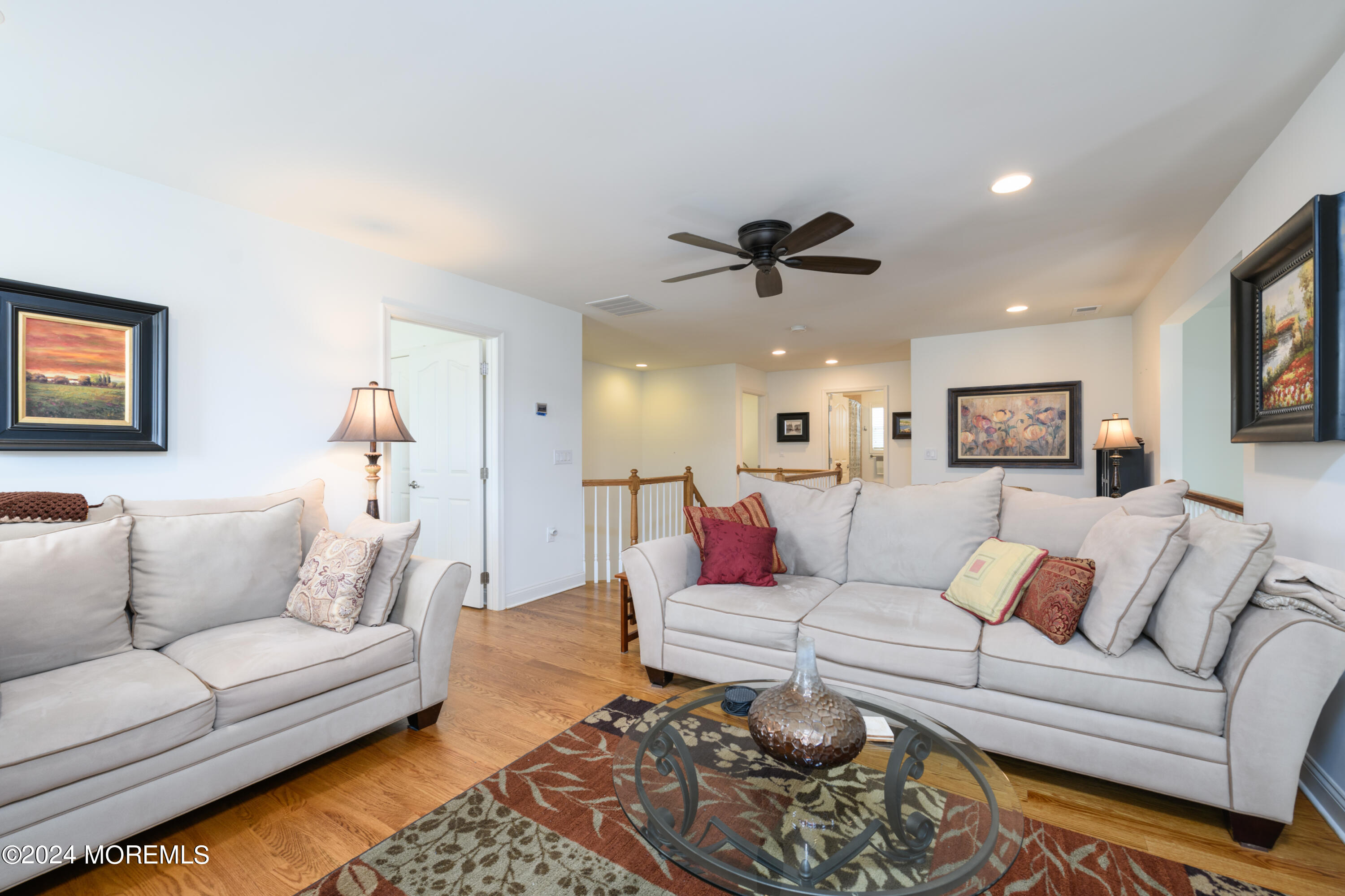 23 Sea Bright Way Waretown, NJ 08758 - Photo 39 of 59 a living room with furniture and a rug