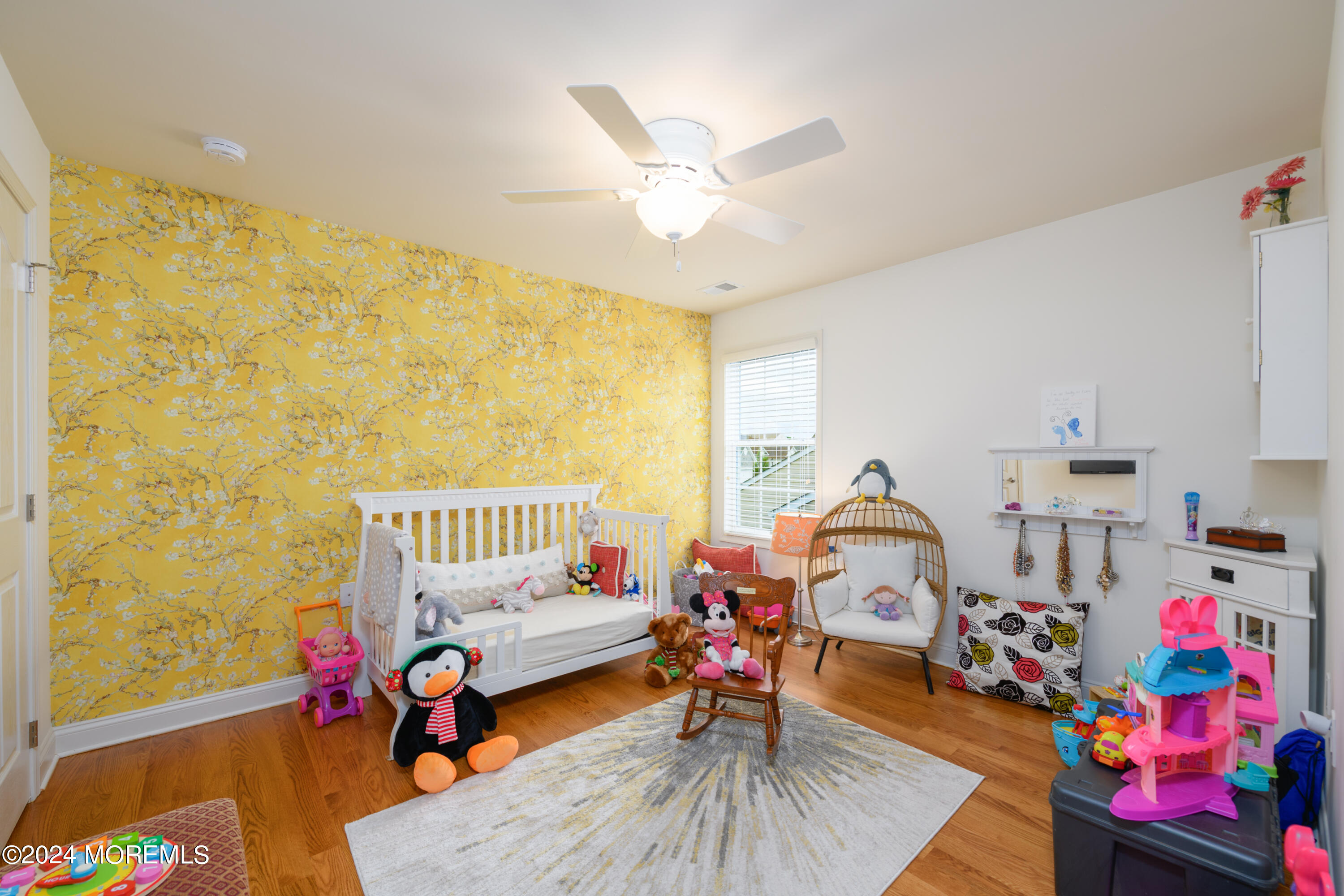 23 Sea Bright Way Waretown, NJ 08758 - Photo 43 of 59 a bedroom with a bed and wooden floor