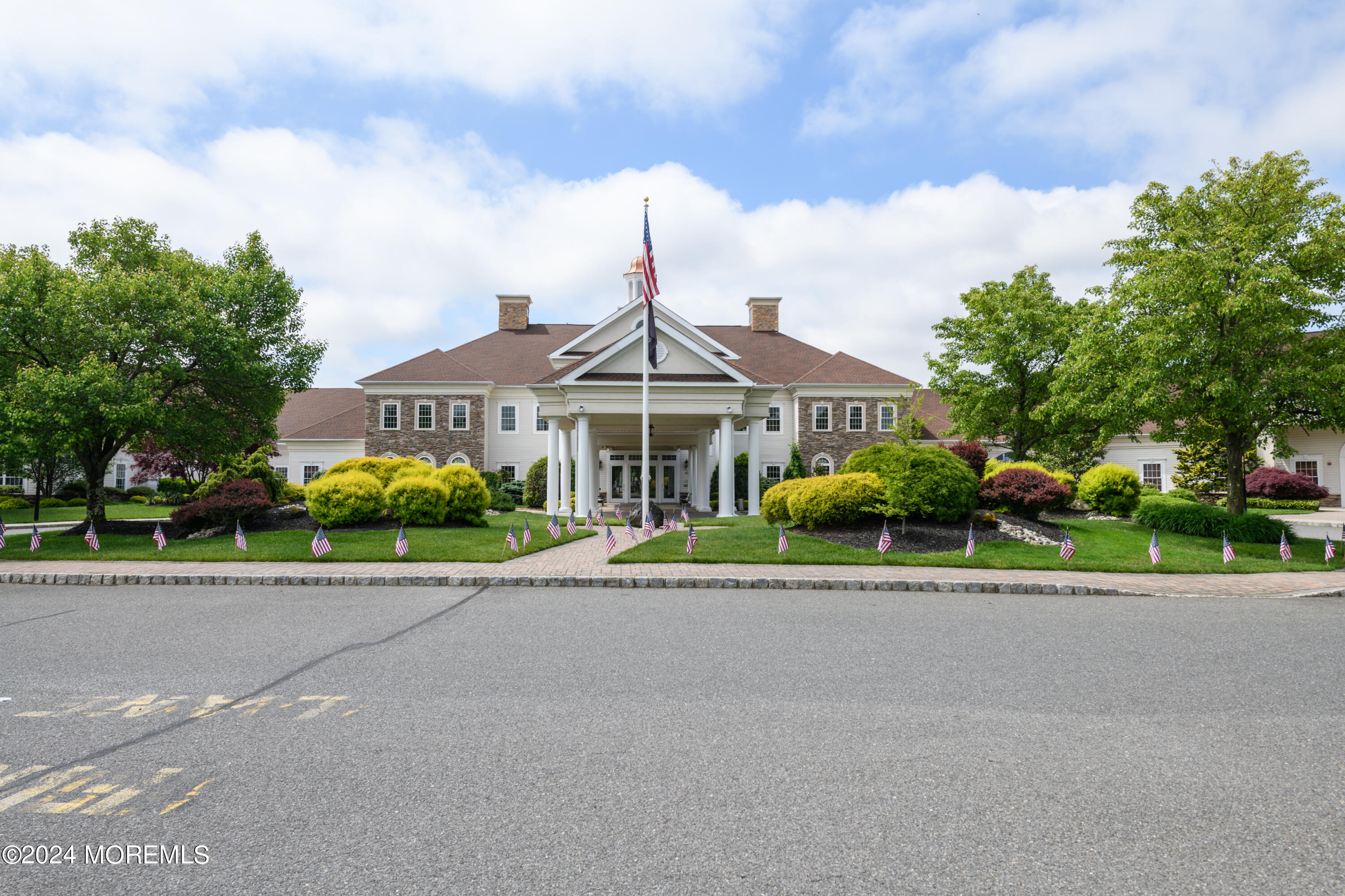 23 Sea Bright Way Waretown, NJ 08758 - Photo 48 of 59 a house with a garden and a car parked in front of it