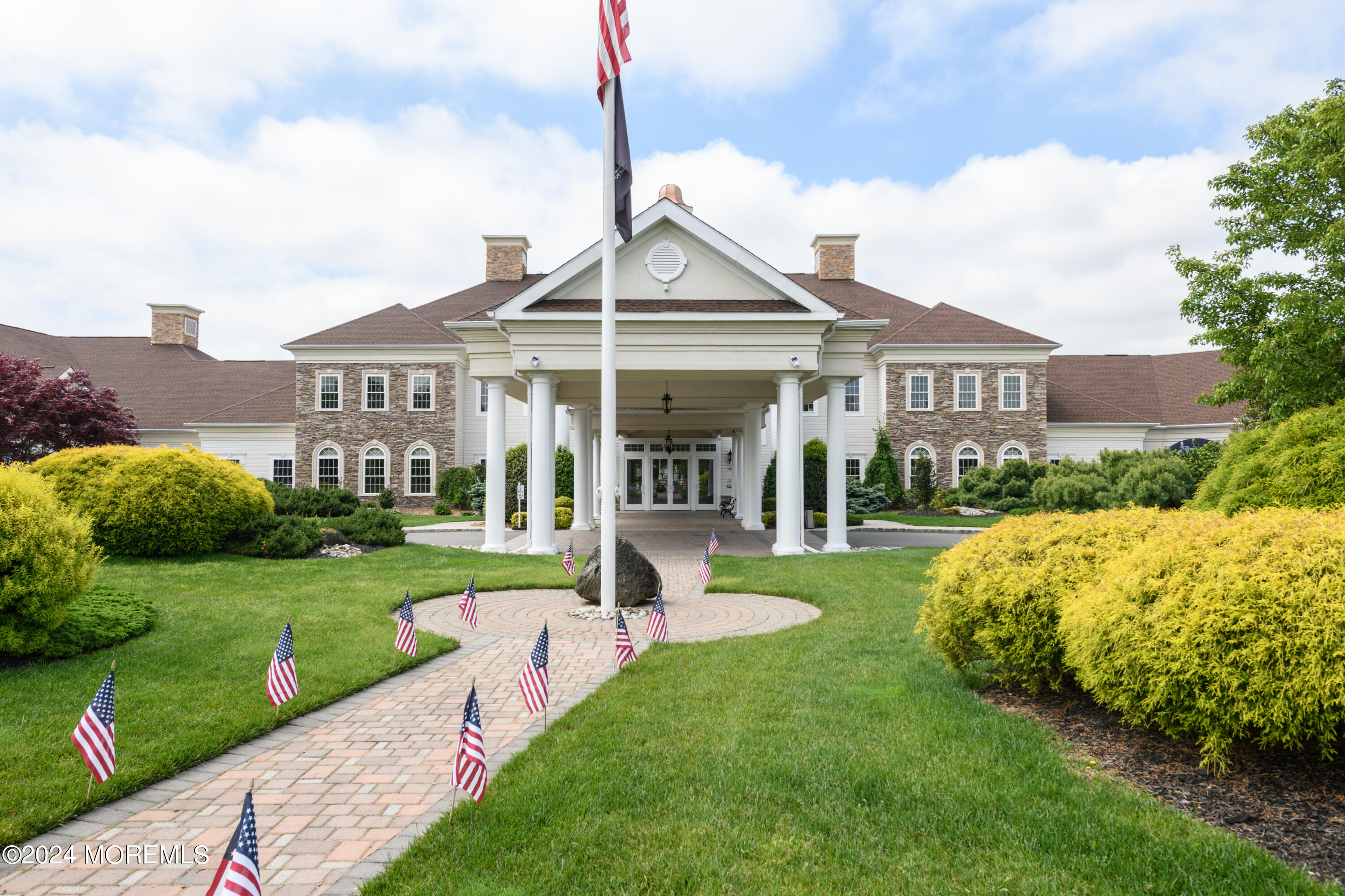 23 Sea Bright Way Waretown, NJ 08758 - Photo 49 of 59 a front view of a house with garden and porch