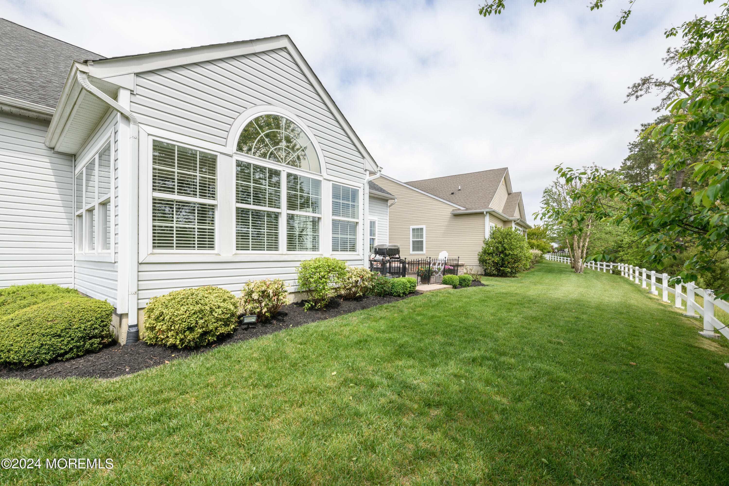 23 Sea Bright Way Waretown, NJ 08758 - Photo 5 of 59 a house view with a garden space