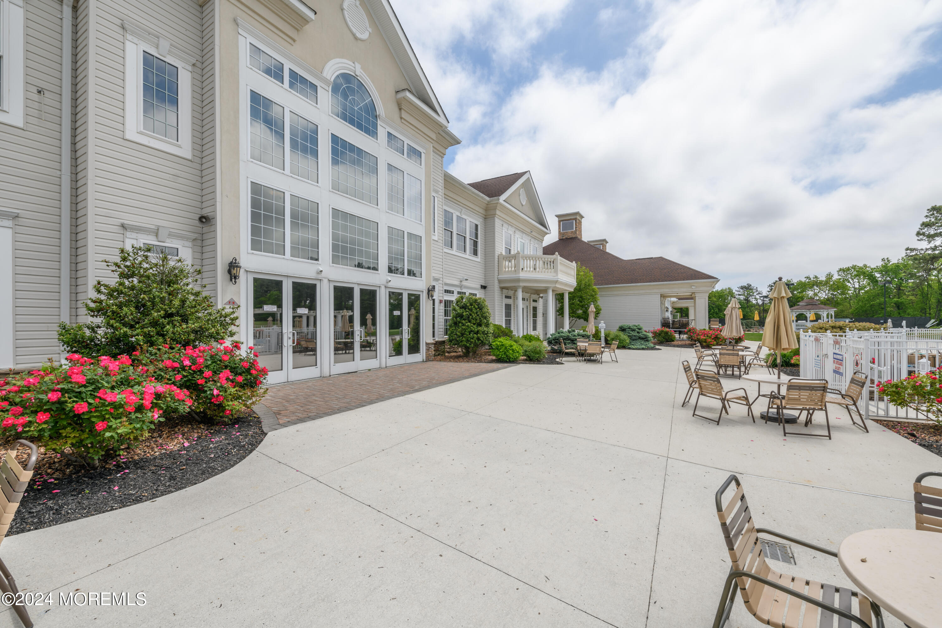23 Sea Bright Way Waretown, NJ 08758 - Photo 55 of 59 a view of a building with sitting area