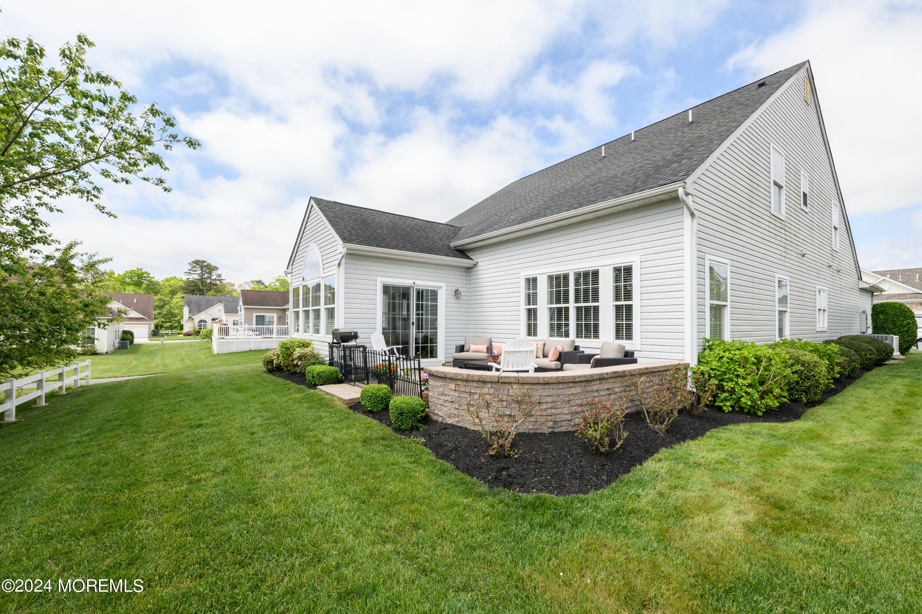 23 Sea Bright Way Waretown, NJ 08758 - Photo 9 of 59 a front view of house with yard and outdoor seating