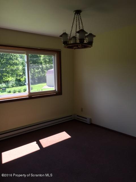 154 Tinklepaugh Road Meshoppen, PA 18630 - Photo 3 of 11 a view of a room with a window