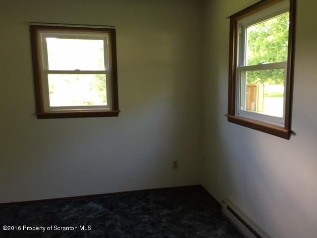 154 Tinklepaugh Road Meshoppen, PA 18630 - Photo 6 of 11 an empty room with a window