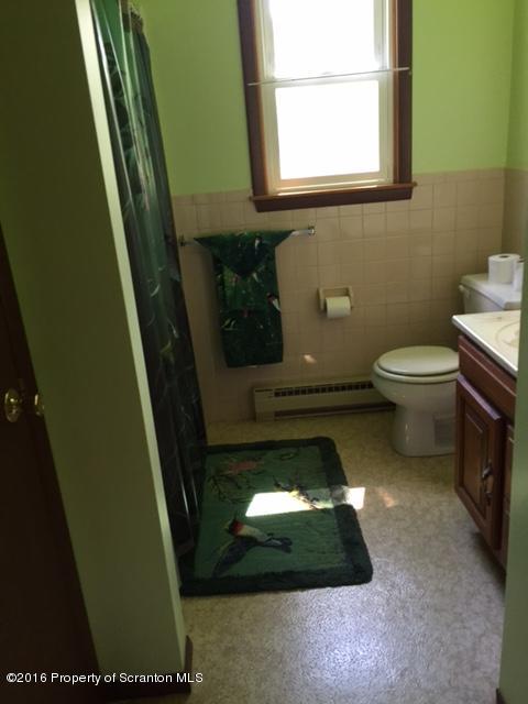 154 Tinklepaugh Road Meshoppen, PA 18630 - Photo 7 of 11 a bathroom with a toilet and a sink