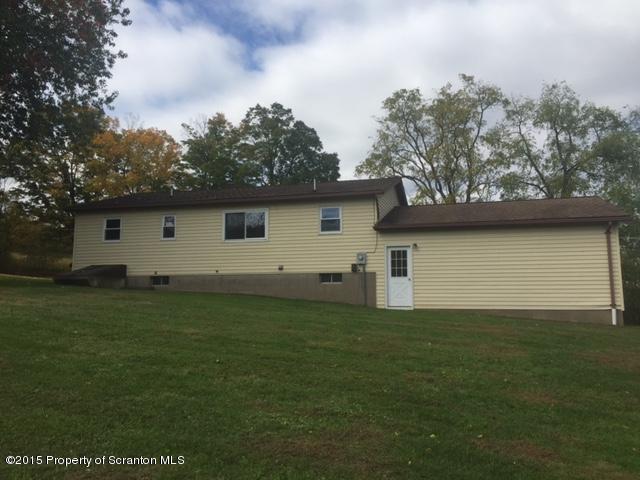 154 Tinklepaugh Road Meshoppen, PA 18630 - Photo 10 of 11 a house view with a garden space
