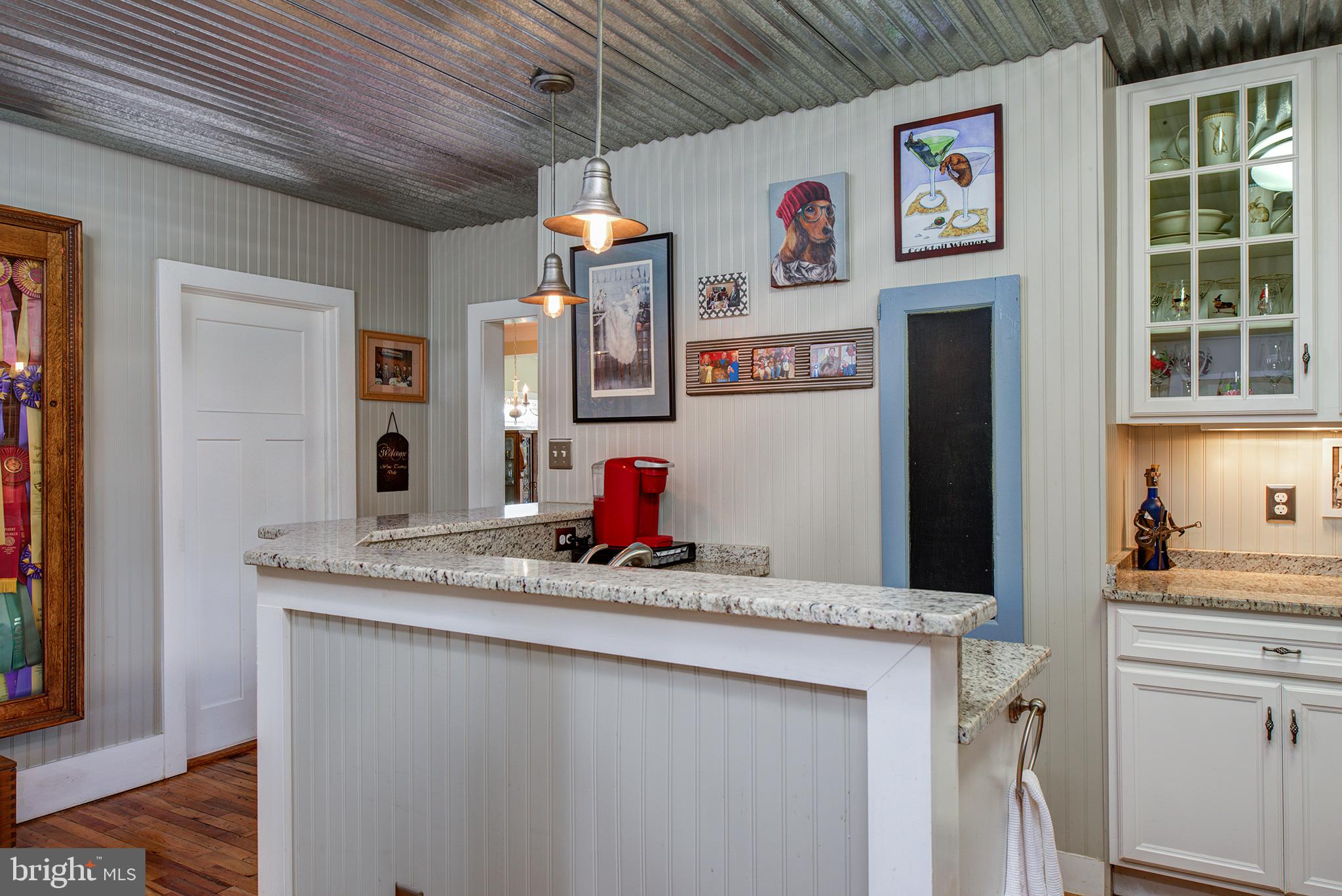21020 St Louis Road Middleburg, VA 20117 - Photo 32 of 47 Wet Bar - Metal Ceiling