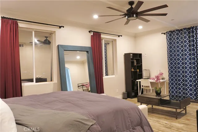 an aerial view of houses covered in trees