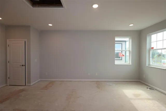 an empty room with windows