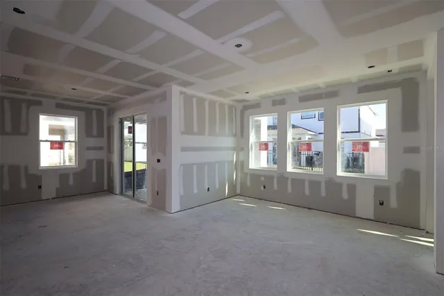 an empty room with windows