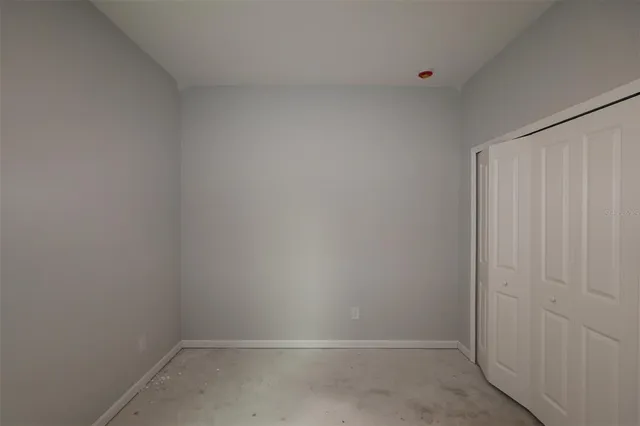 a empty room with a white door
