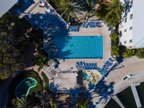 a view of a swimming pool with a patio