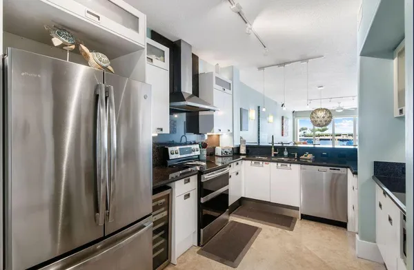 a view of a balcony with chairs