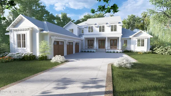 a front view of a house with a garden and patio