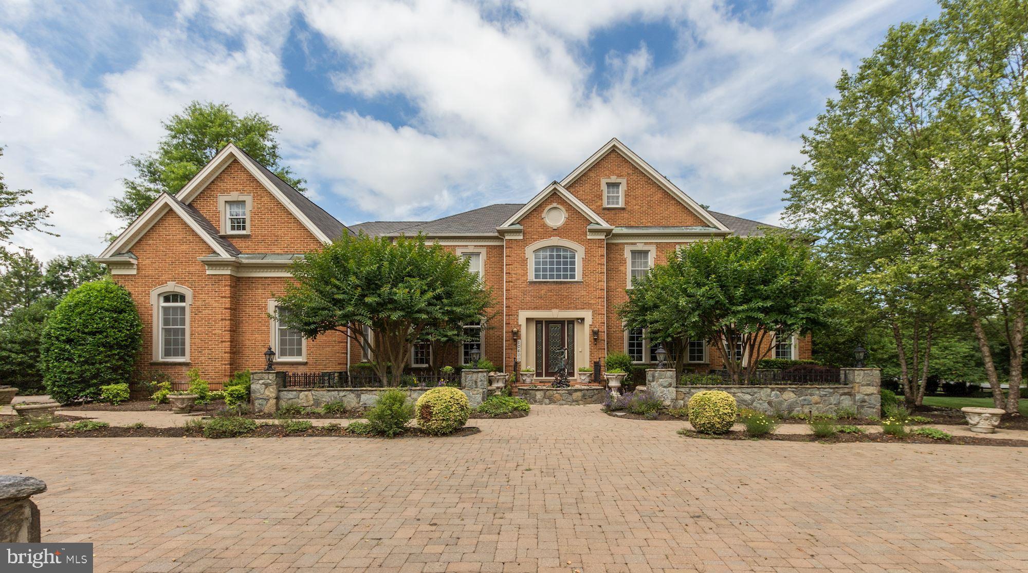 10600 Rivers Bend Lane Potomac, MD 20854 - Photo 1 of 42 Front Exterior w/Paver Driveway, Gated Garage Area