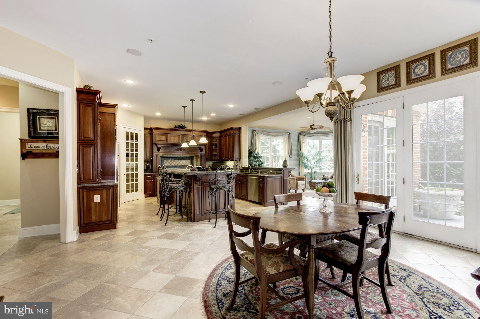 10600 Rivers Bend Lane Potomac, MD 20854 - Photo 17 of 42 Open Kitchen Eating Area w/Access to Terrace
