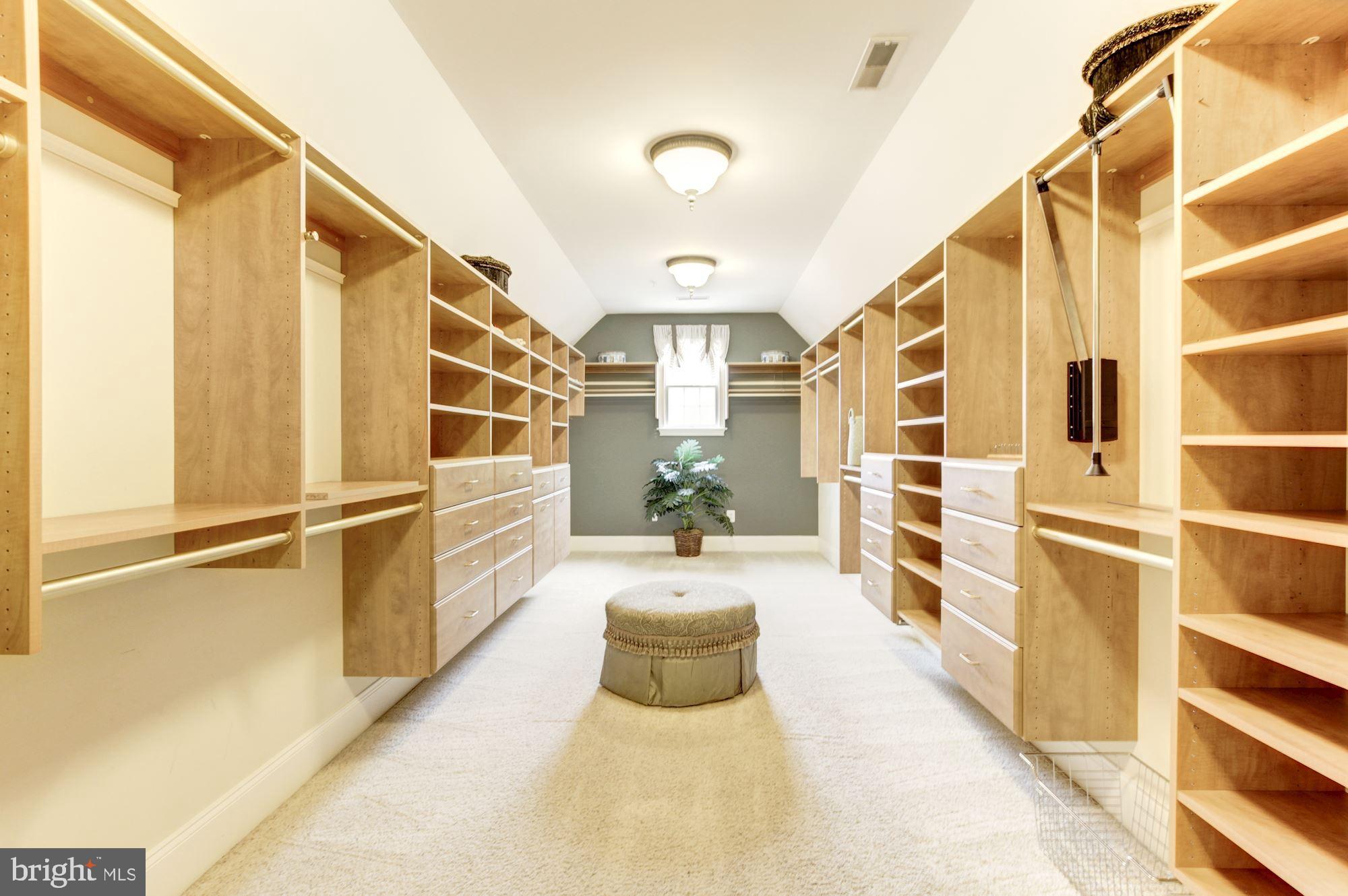 10600 Rivers Bend Lane Potomac, MD 20854 - Photo 24 of 42 Massive Walk-In Closet with Custom Built-Ins
