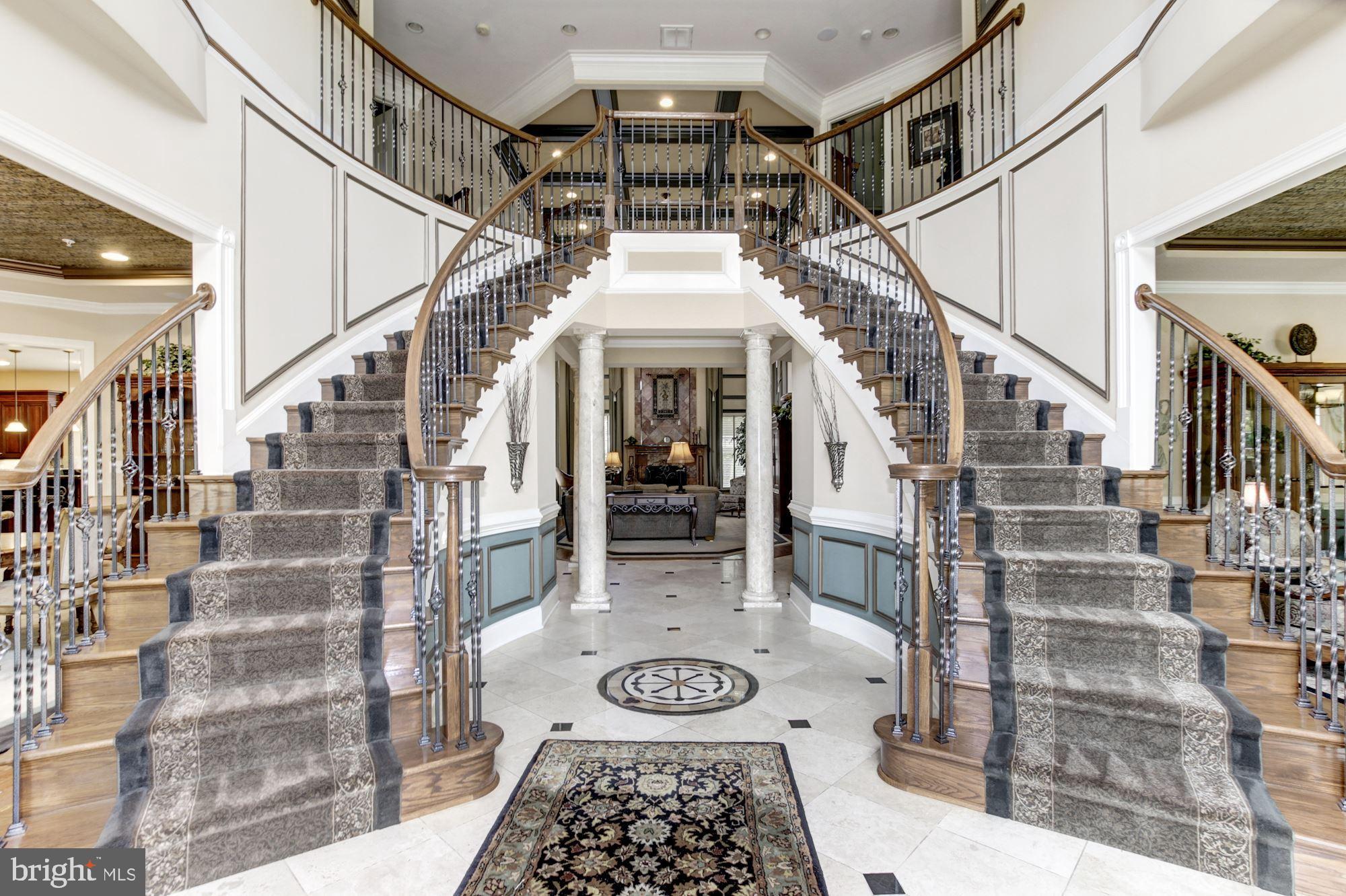 10600 Rivers Bend Lane Potomac, MD 20854 - Photo 5 of 42 Dramatic 2 Story Entry Foyer w/Sweeping Staircase