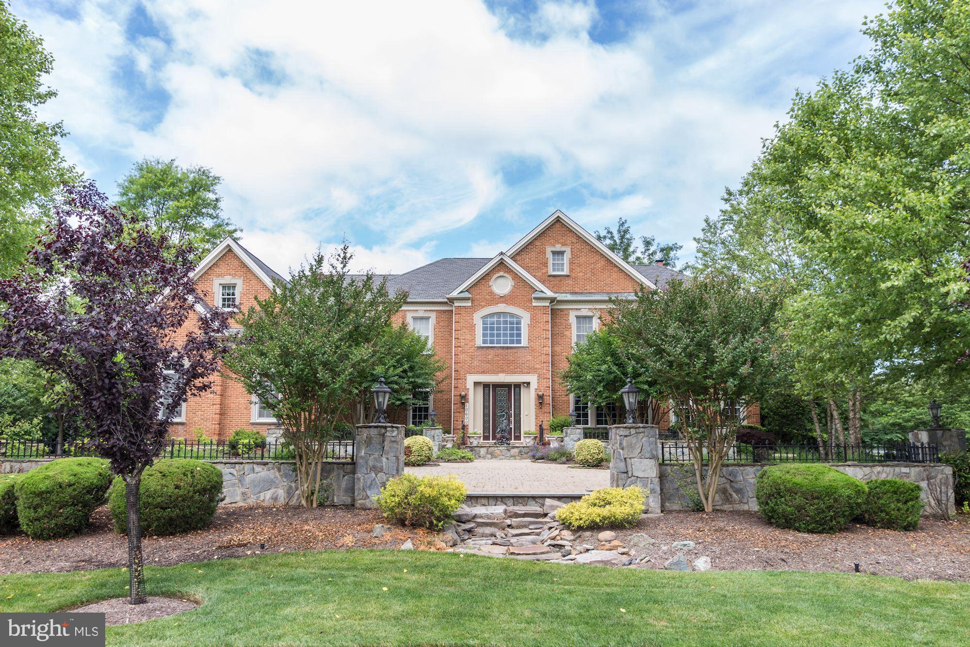 10600 Rivers Bend Lane Potomac, MD 20854 - Photo 41 of 42 Front Exterior-Stone Walls, Columns Paver Drvwy