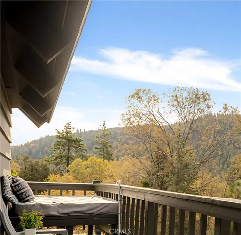 a view of balcony with furniture