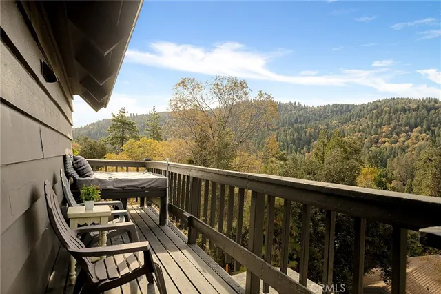 a view of a balcony with chairs