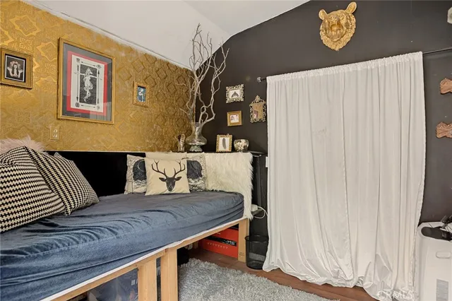 a living room with a couch and a window