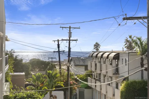 a view of a room with rack and white walls
