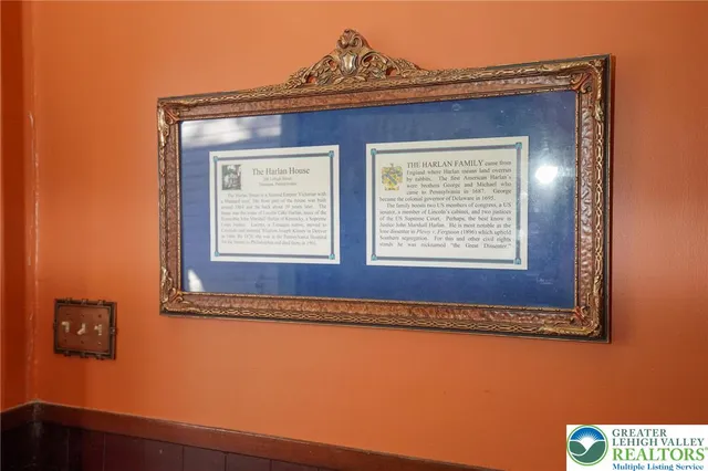 a view of front door with wooden floor